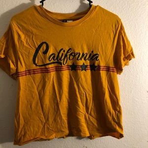 Mustard yellow cropped graphic tee